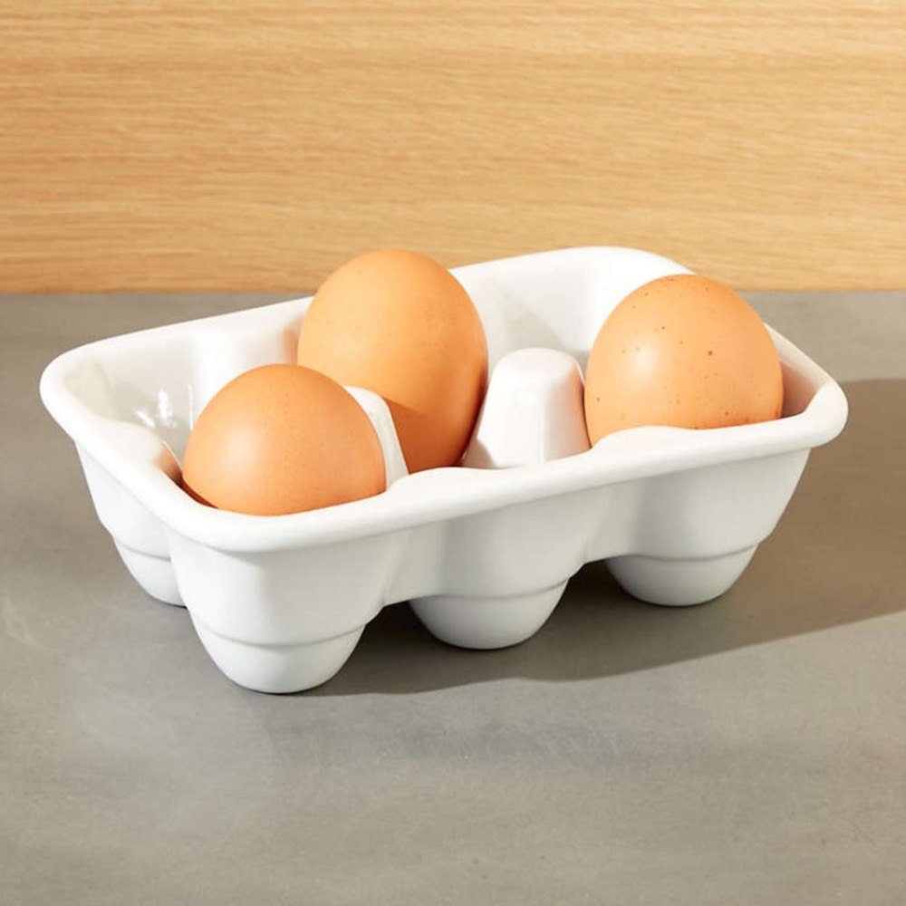 Crate & Barrel White Ceramic Egg Holder. Sold separately. Bundle to get both